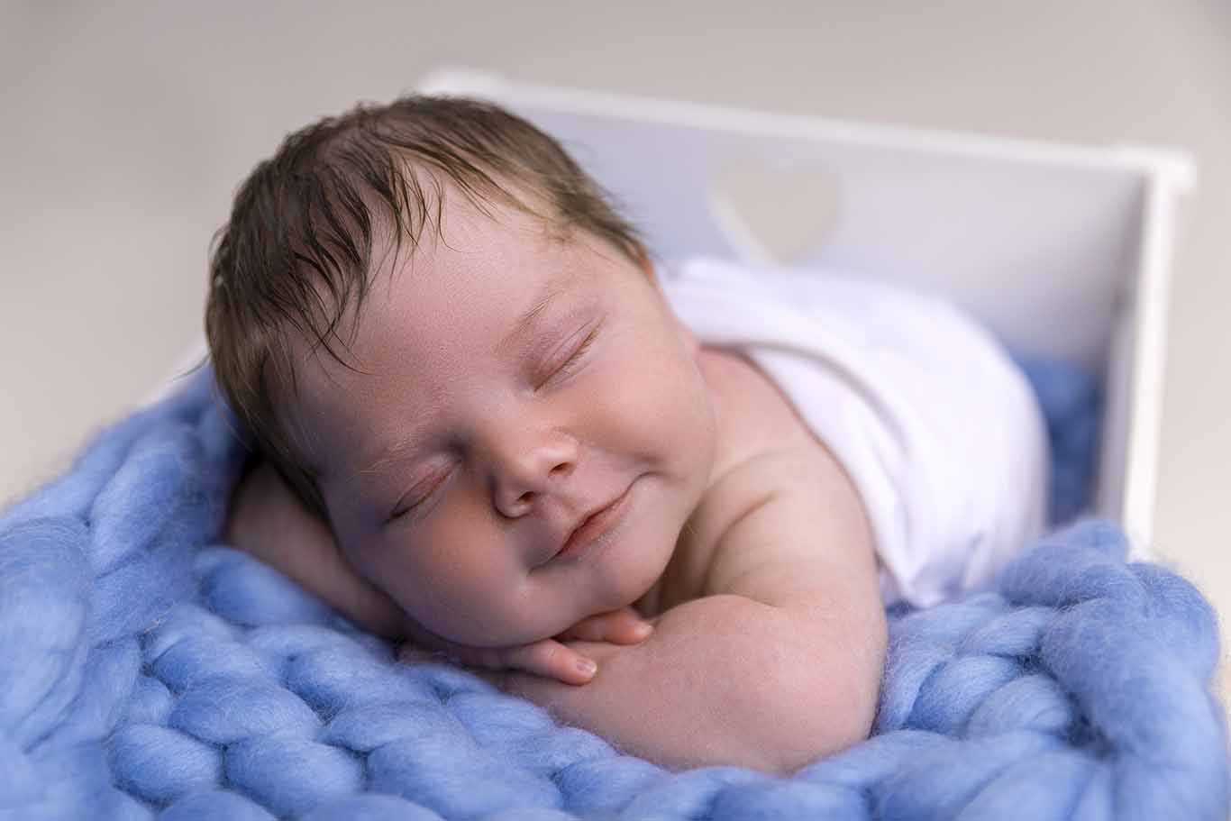 newborn smiling