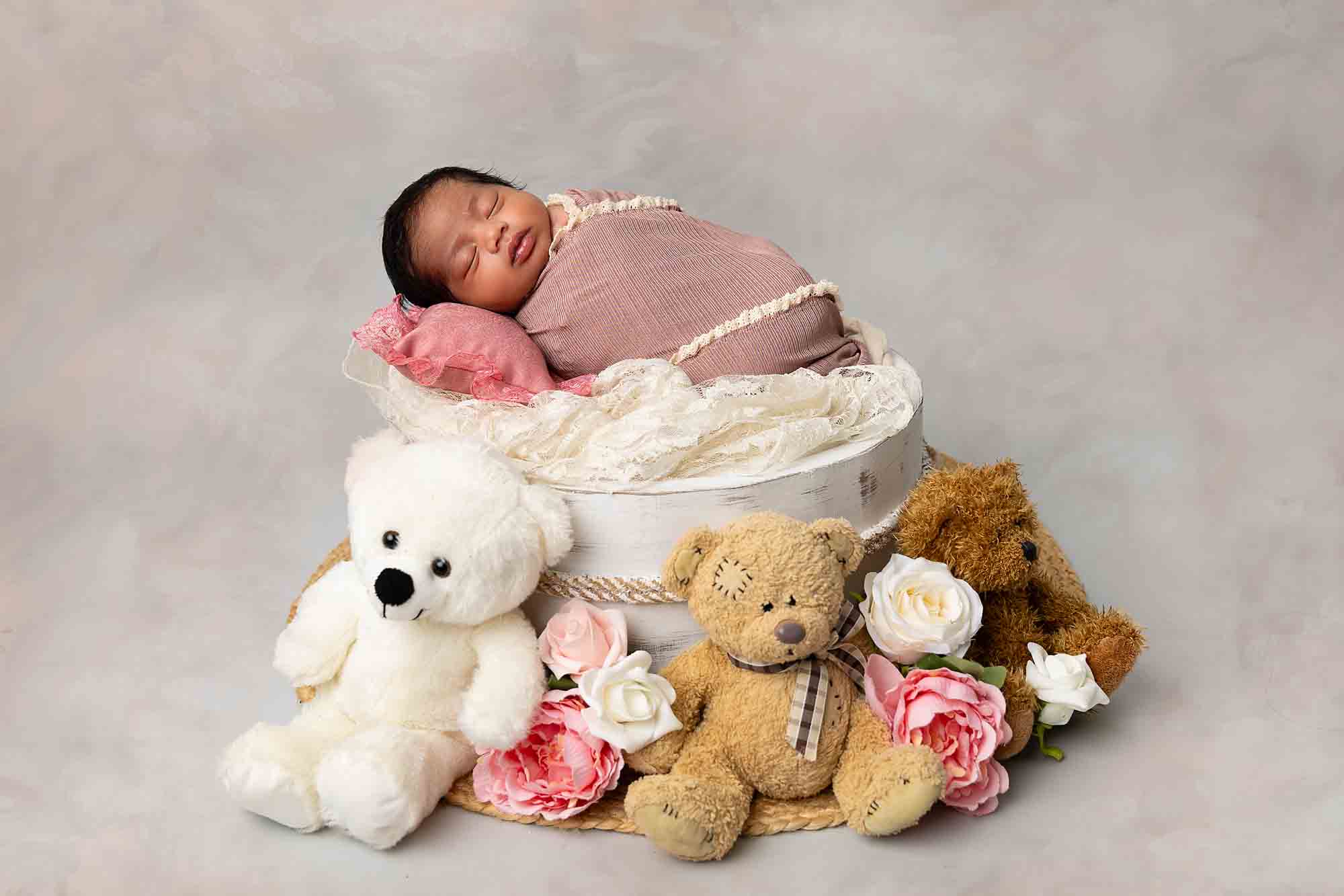 baby with teddies